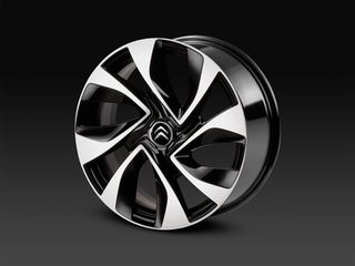 Large black-accented gloss alloy wheels