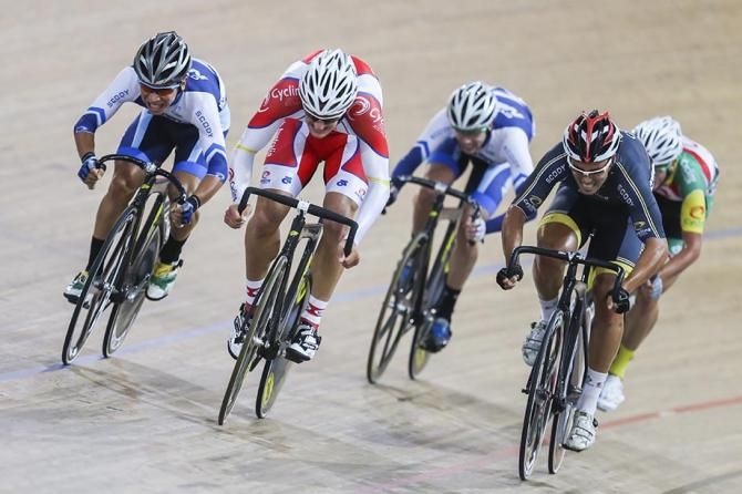 Luke Davison sprints for the win in the scratch race.