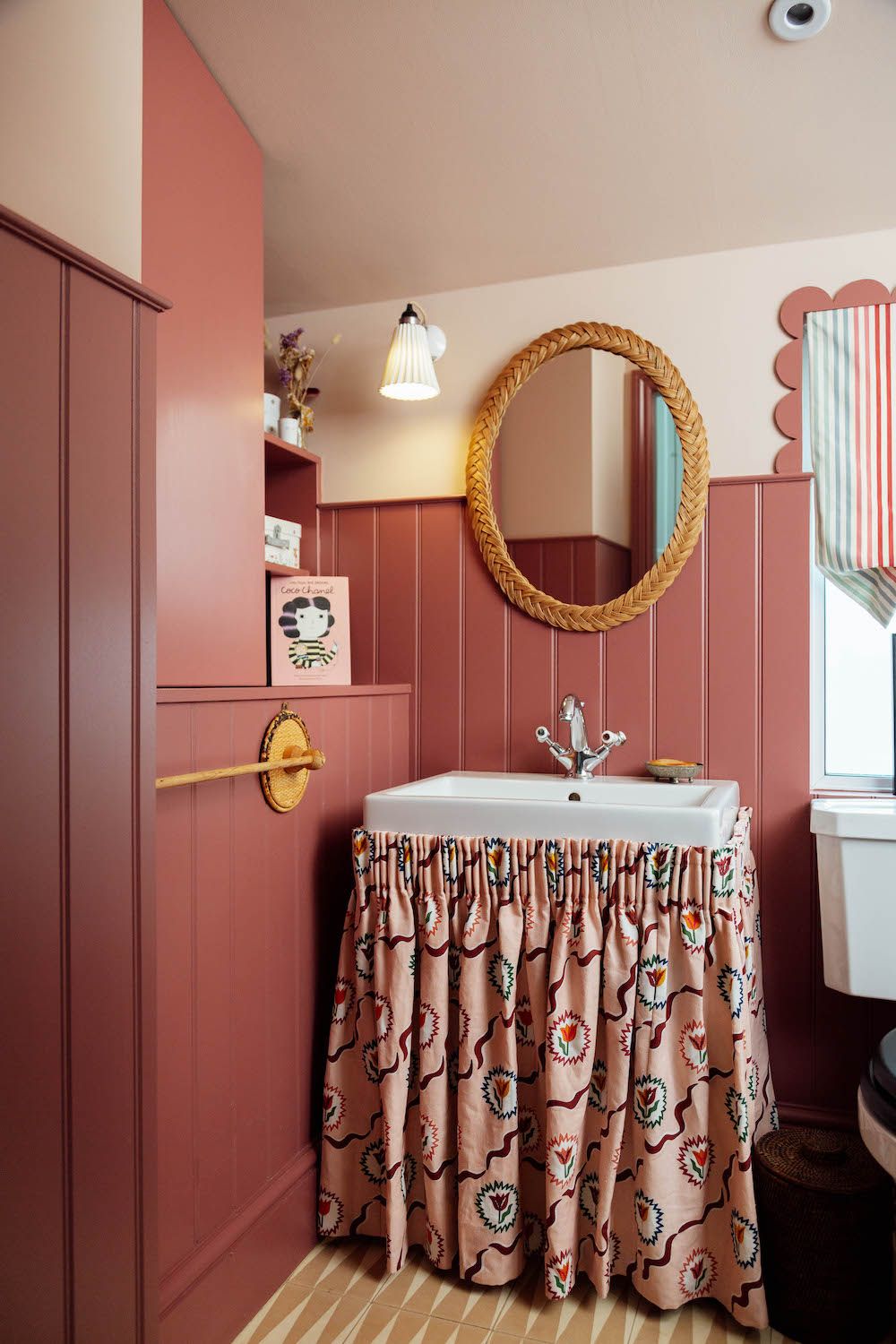 Bathroom vanity ideas with a pink plaid washbasin skirt