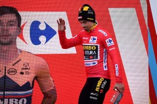 ALTO DE LA FARRAPONA LAGOS DE SOMIEDO SPAIN OCTOBER 31 Podium Primoz Roglic of Slovenia and Team Jumbo Visma Red Leader Jersey Celebration Trophy during the 75th Tour of Spain 2020 Stage 11 a 170km stage from Villaviciosa to Alto de La Farrapona Lagos de Somiedo 1708m lavuelta LaVuelta20 La Vuelta on October 31 2020 in Alto de La Farrapona Lagos de Somiedo Spain Photo by David RamosGetty Images