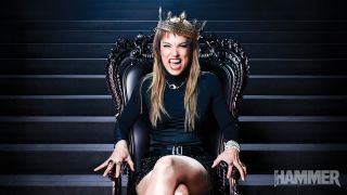 Lzzy Hale of Halestorm sat in a throne