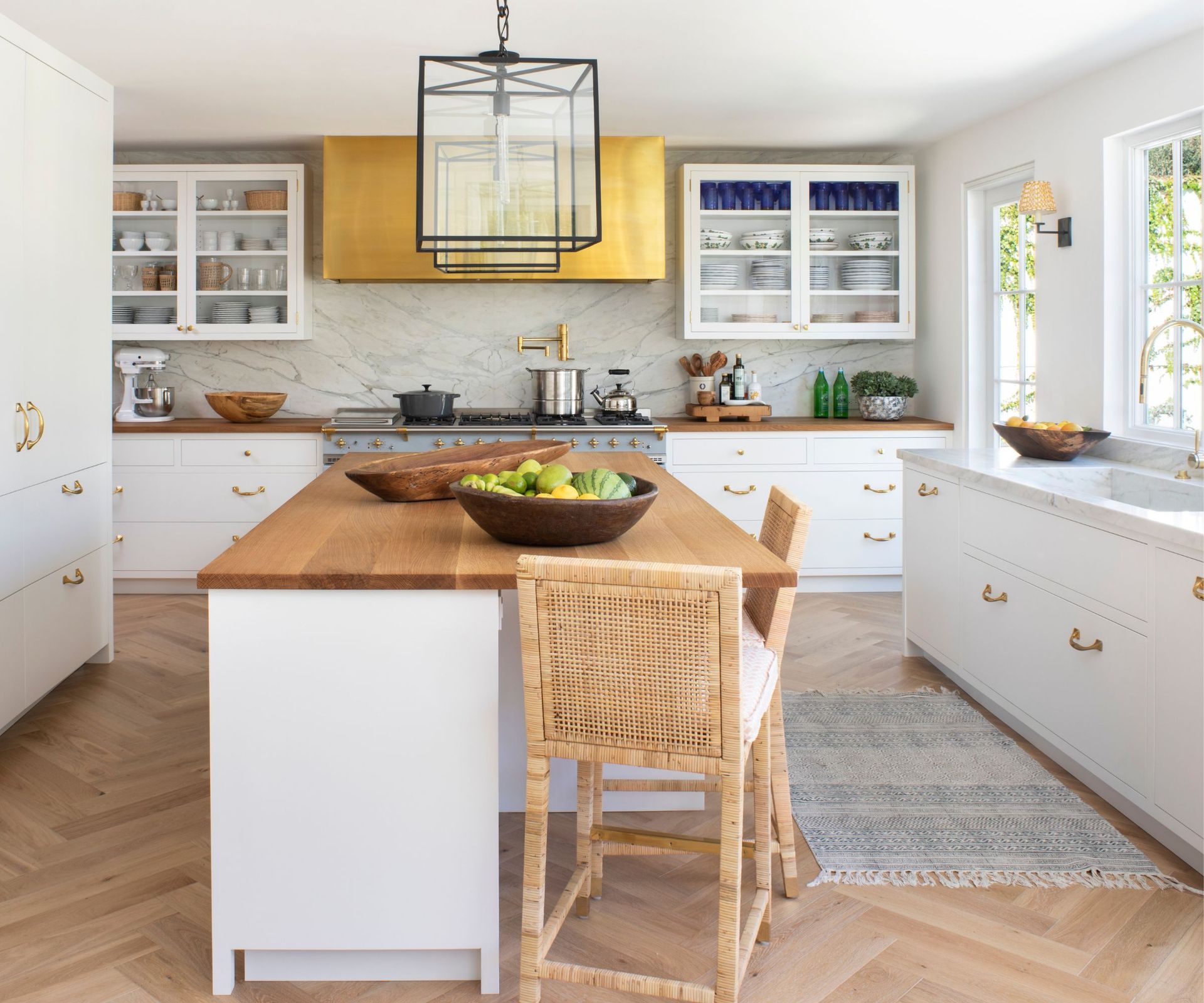 Wooden top kitchen island, rug, black and glass lights