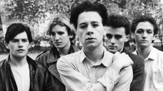 Photo of Jim KERR and SIMPLE MINDS; Jim Kerr (centre) (Photo by Virginia Turbett/Redferns)