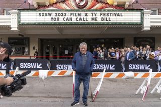 William Shatner stands in front of a marquee highlighting his new documentary "You Can Call Me Bill."