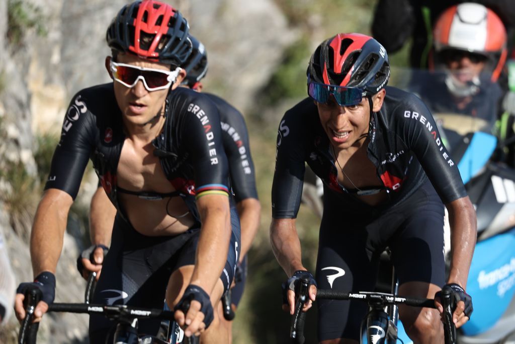 Team Ineos rider Colombias Egan Bernal R climbs the Grand Colombier pass behind the leaders group during the 15th stage of the 107th edition of the Tour de France cycling race 175 km between Lyon and Grand Colombier on September 13 2020 Photo by KENZO TRIBOUILLARD AFP Photo by KENZO TRIBOUILLARDAFP via Getty Images