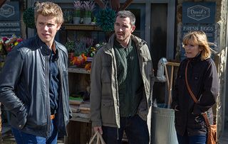 Robert Sugden is with Rhona Goskirk and Pete Barton when he learns Ross Barton and Rebecca White are planning to leave the village with his son Sebastian and Charity's boy Moses. (Picture: ITV)