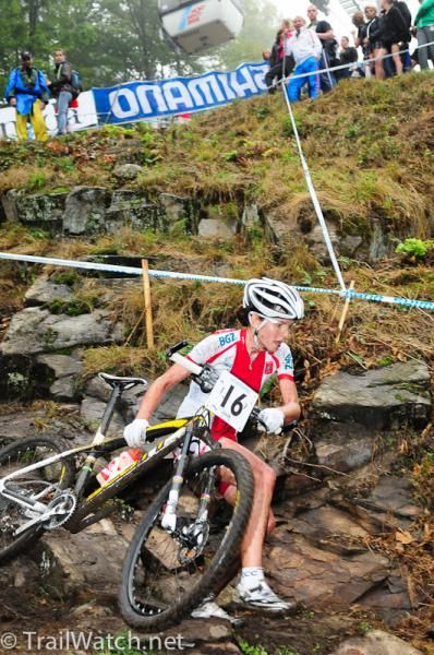 Maja Wloszcowska (Poland) stumbles while running down the most treacherous descent.