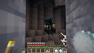 Minecraft - the player faces off against the warden with snowballs