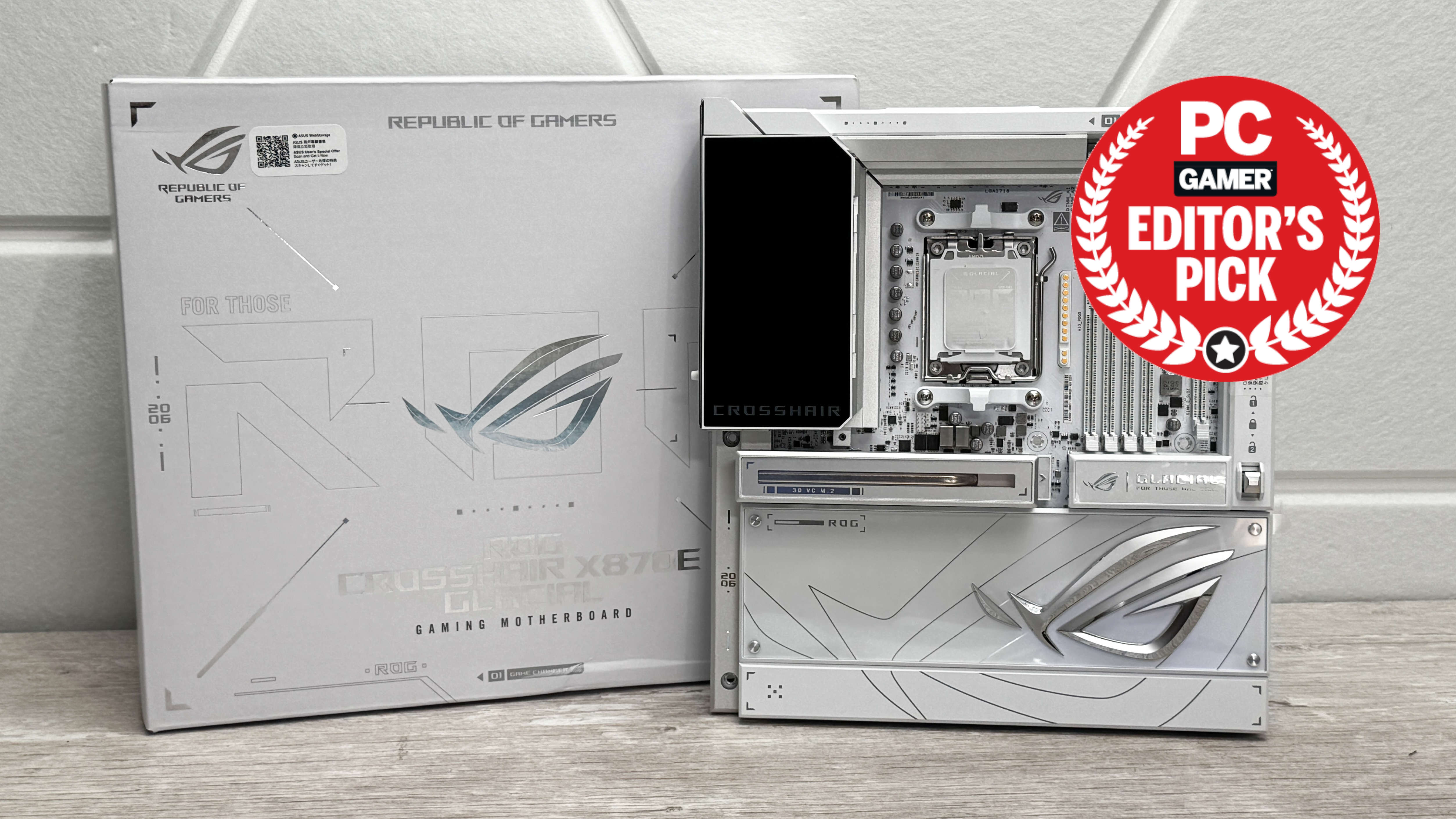 Asus ROG Crosshair X870E Glacial gaming motherboard with the PC Gamer Editor's Pick award logo