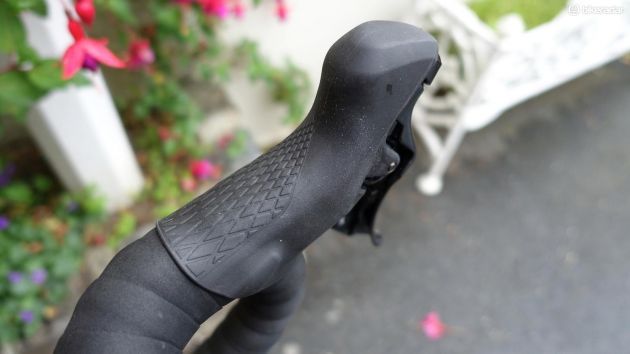 In a first for Shimano's mechanical road shifters, the new Dura-Ace levers have a textured hood for added grip