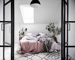Shared bedroom ideas - Girls bedroom design with black framed crittal doors by Anders Bergstedt
