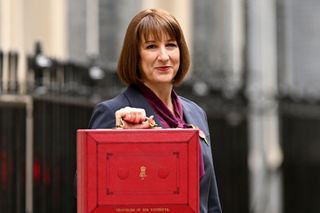 Chancellor Rachel Reeves poses outside 11 Downing Street with the red box, shortly before delivering the Autumn Budget on 30 October 2024