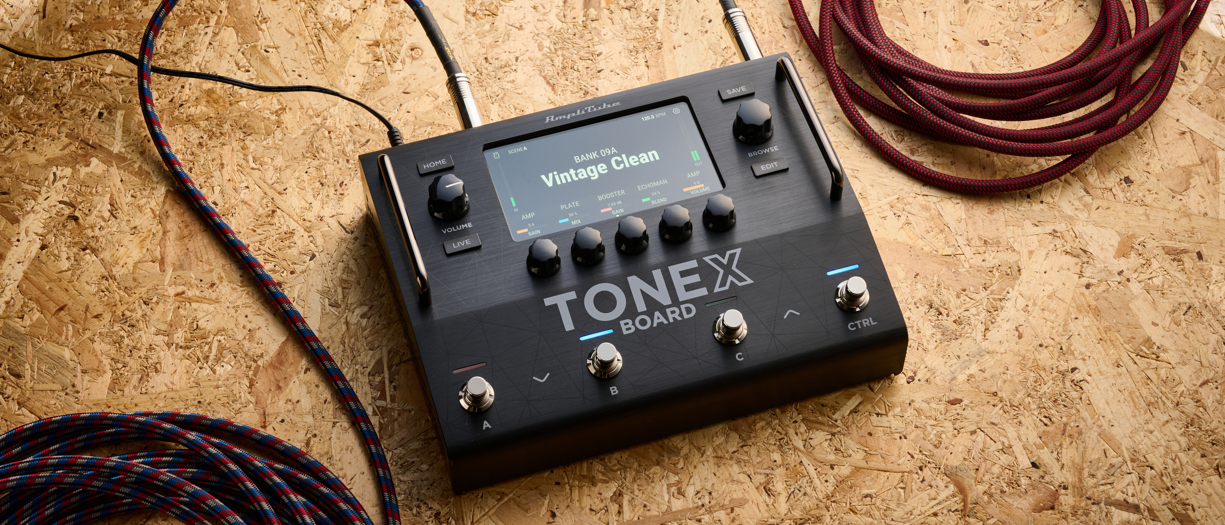 IK Multimedia Tonex Board shot on OSB wood surface.