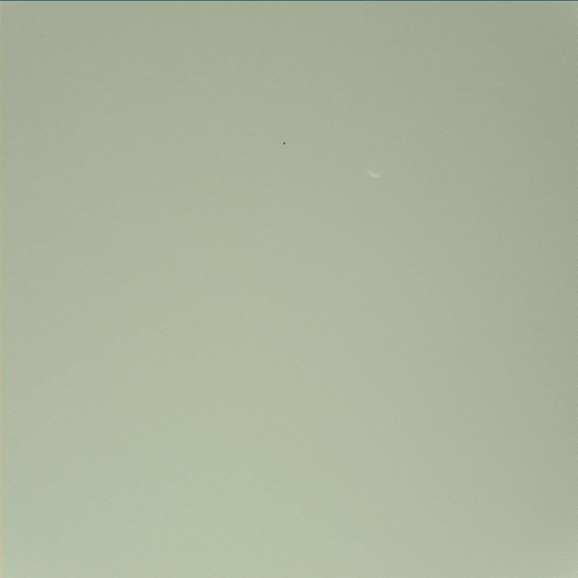 NASA's Mars rover Curiosity snapped this photo of the larger Martian moon Phobos during a Mars sky observing session. Phobos is Mars' larger moon, but only 14 miles across. Image released Sept. 26, 2012.