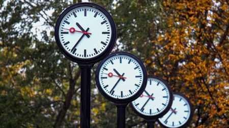 A row of clocks in Germany in autumn, just before daylight saving time 2026