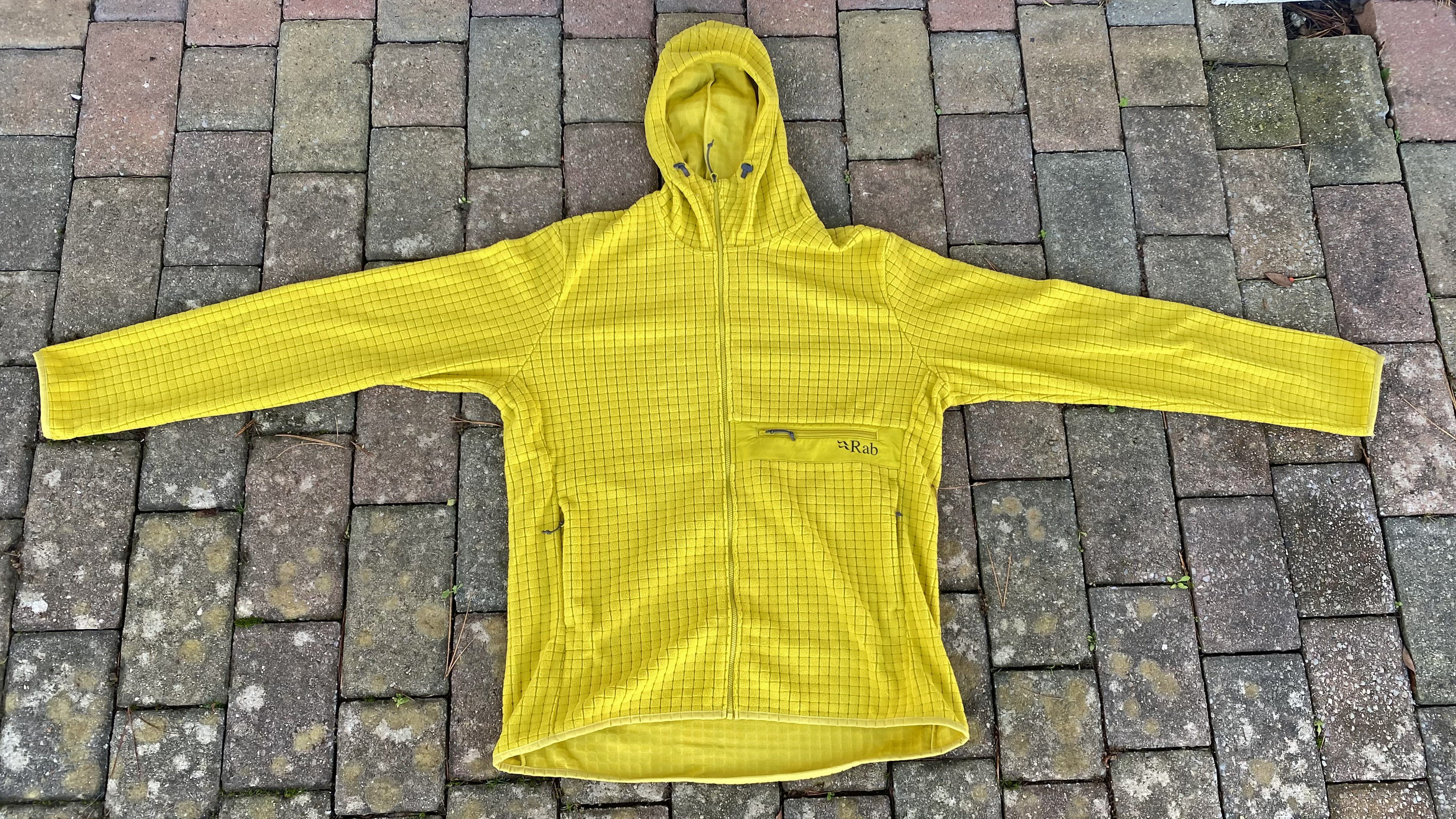 The Rab Ramshaw Hoody laid flat