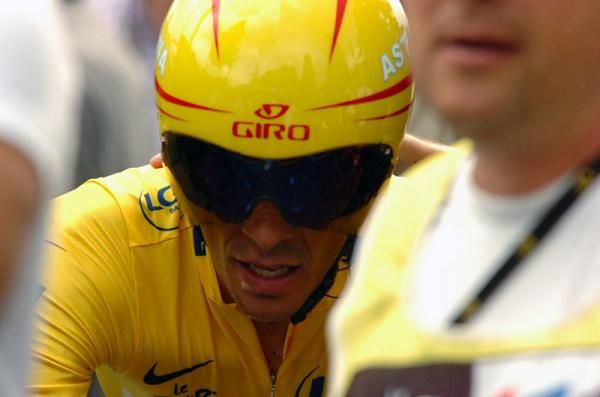 Alberto Contador (Astana) shows the effort it took to win the stage 18 time trial.