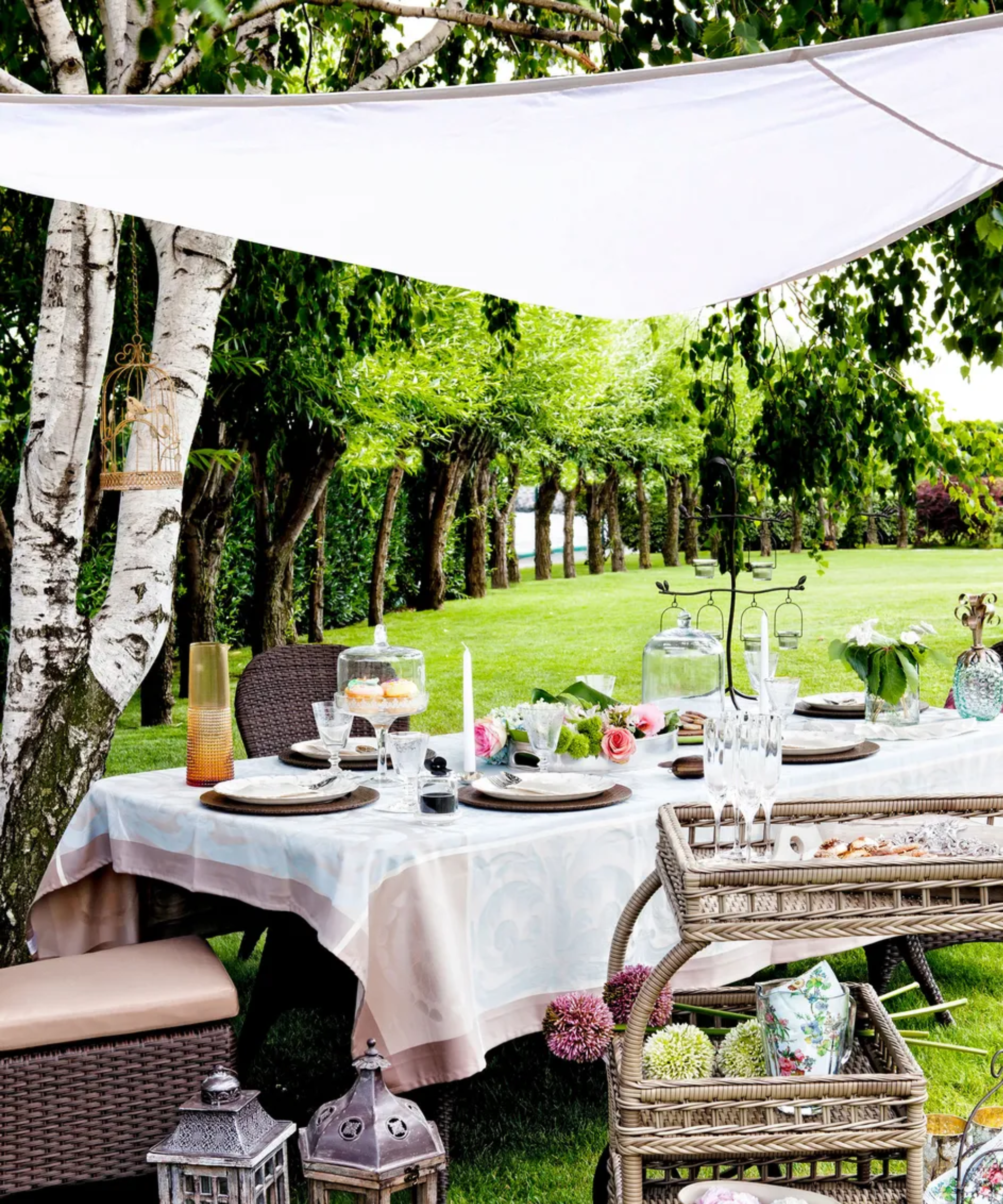 Shade sail over table in garden