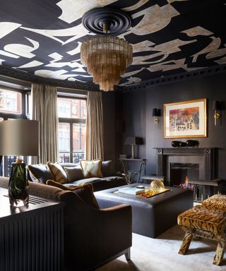 Dark living room with patterned ceiling