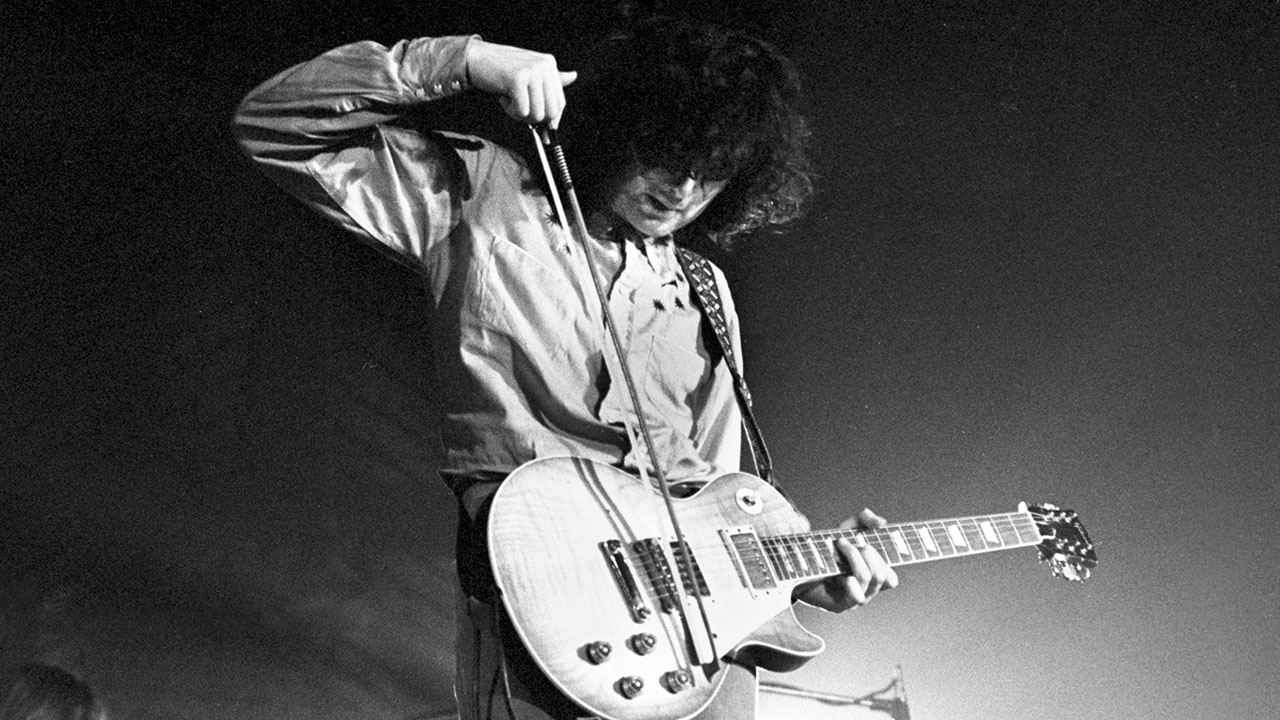 Jimmy Page of Led Zeppelin plays a Gibson Les Paul Standard guitar with a violin bow while performing on stage at Oude Rai on 27th May 1972 in Amsterdam, Netherlands.