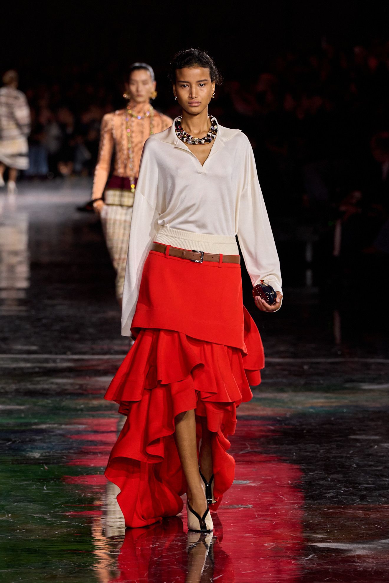 A red skirt on the chanel runway