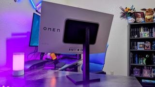 The HP OMEN Transcend 32 on a desk, seen from the rear while on its stand.