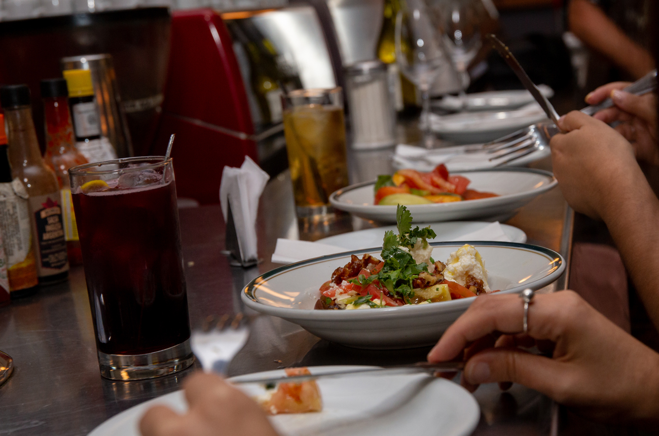 Dishes of food on a restaurant counter