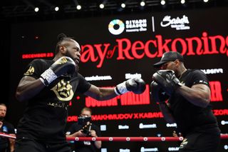 Deontay Wilder trains with his head coach Malik Scott (obscured) during the media workout ahead of the Heavyweight fight between Deontay Wilder and Joseph Parker during the Day of Reckoning card at the Press Arena, Kingdom Arena on December 20, 2023 in Riyadh, Saudi Arabia. (Photo by Richard Pelham/Getty Images)