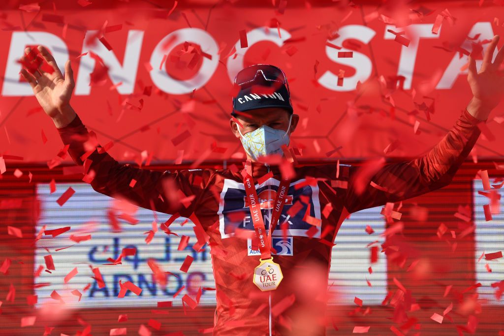 ABU DHABI UNITED ARAB EMIRATES FEBRUARY 21 Podium Mathieu van der Poel of The Netherlands and Team AlpecinFenix Red Leader Jersey Celebration during the 3rd UAE Tour 2021 Stage 1 a 176km stage from Al Dhafra Castle to Al Mirfa Trophy Mask Covid Safety Measures UAETour on February 21 2021 in Abu Dhabi United Arab Emirates Photo by Tim de WaeleGetty Images