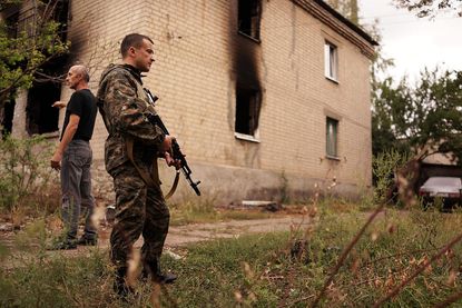 Skirmishes test Ukraine ceasefire as Russia sends unapproved convoy across border