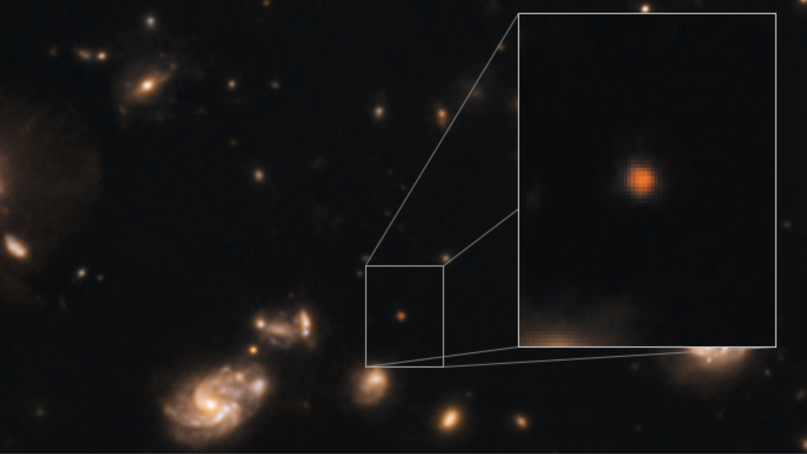 Galaxies in the far universe with a mysterious orange dot
