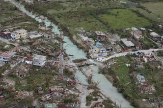 Damage from Hurricane Matthew, which passed through Haiti on Oct. 4, 2016, as a Category 4 storm, is evident in this aerial view showing downed trees and flooding.
