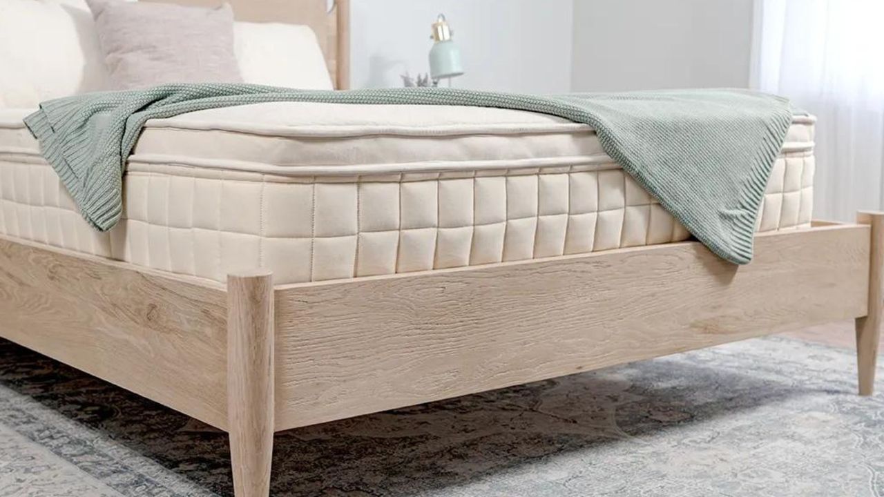 A close up of the corner of the Naturepedic Concerto Organic Pillow Top mattress