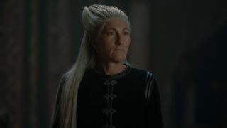Rhaenys (Eve Best) dressed in a black cloak in House of the Dragon