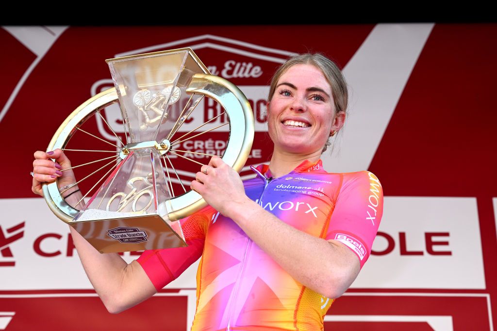 SIENA ITALY MARCH 04 Demi Vollering of The Netherlands and Team SD Worx celebrates at podium as race winner during the Eroica 9th Strade Bianche 2023 Womens a 136km one day race from Siena to Siena 318m StradeBianche on March 04 2023 in Siena Italy Photo by Luc ClaessenGetty Images