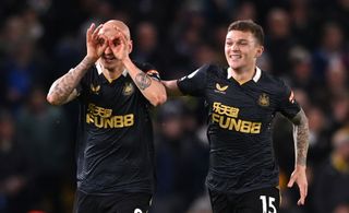 Jonjo Shelvey of Newcastle celebrates his goal with Kieran Trippier (r) during the Premier League match between Leeds United and Newcastle United at Elland Road on January 22, 2022 in Leeds, England.