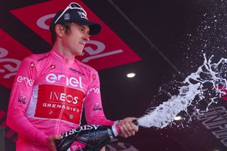 INEOS Grenadierss British rider Geraint Thomas celebrates his overall leaders pinks jersey on the podium after the 18th stage of the Giro dItalia 2023 cycling race 161 km between Oderzo and Val di Zoldo on May 25 2023 Photo by Luca Bettini AFP Photo by LUCA BETTINIAFP via Getty Images