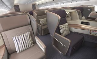 Luxury interior of plane with individual seats