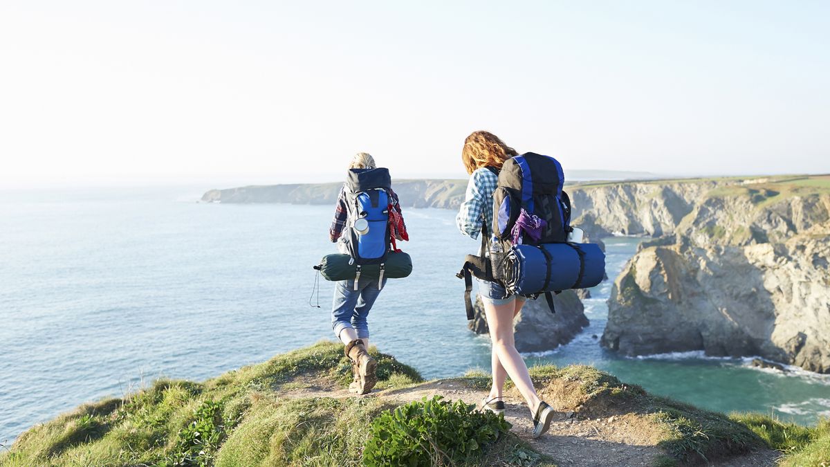 Hikers on a cliff-top