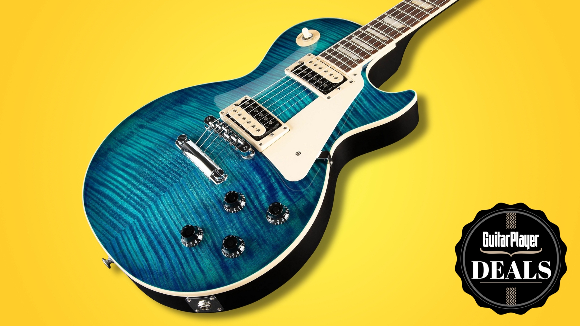 A Gibson Les Paul electric guitar on a yellow background