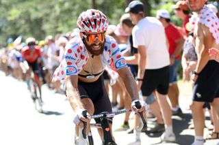 Simon Geschke climbs in the polka dot jersey at the 2022 Tour de France