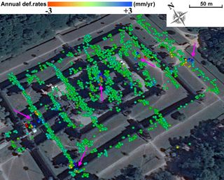 Annual deformation rates (millimeters per year) on the Angkor Wat Temple. The pink arrows mark vulnerable monuments.