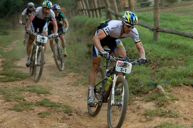 Karl Platt and Urs Huber of Team Bulls do all they can to hang on to the break away