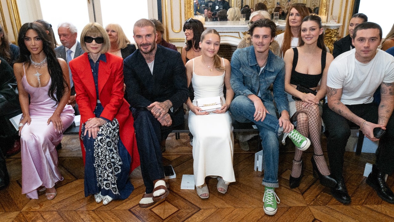 PARIS, FRANCE - SEPTEMBER 29: (L-R) Kim Kardashian, Anna Wintour, David Beckham, Harper Beckham, Cruz Beckham, Nicola Peltz Beckham and Brooklyn Beckham attend the Victoria Beckham SS24 fashion show during Paris Fashion Week on September 29, 2023 in Paris, France. (Photo by Darren Gerrish/Getty Images for Victoria Beckham)