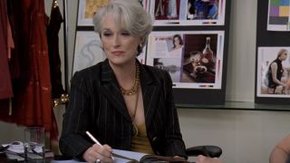 Miranda at a meeting in The Devil Wears Prada