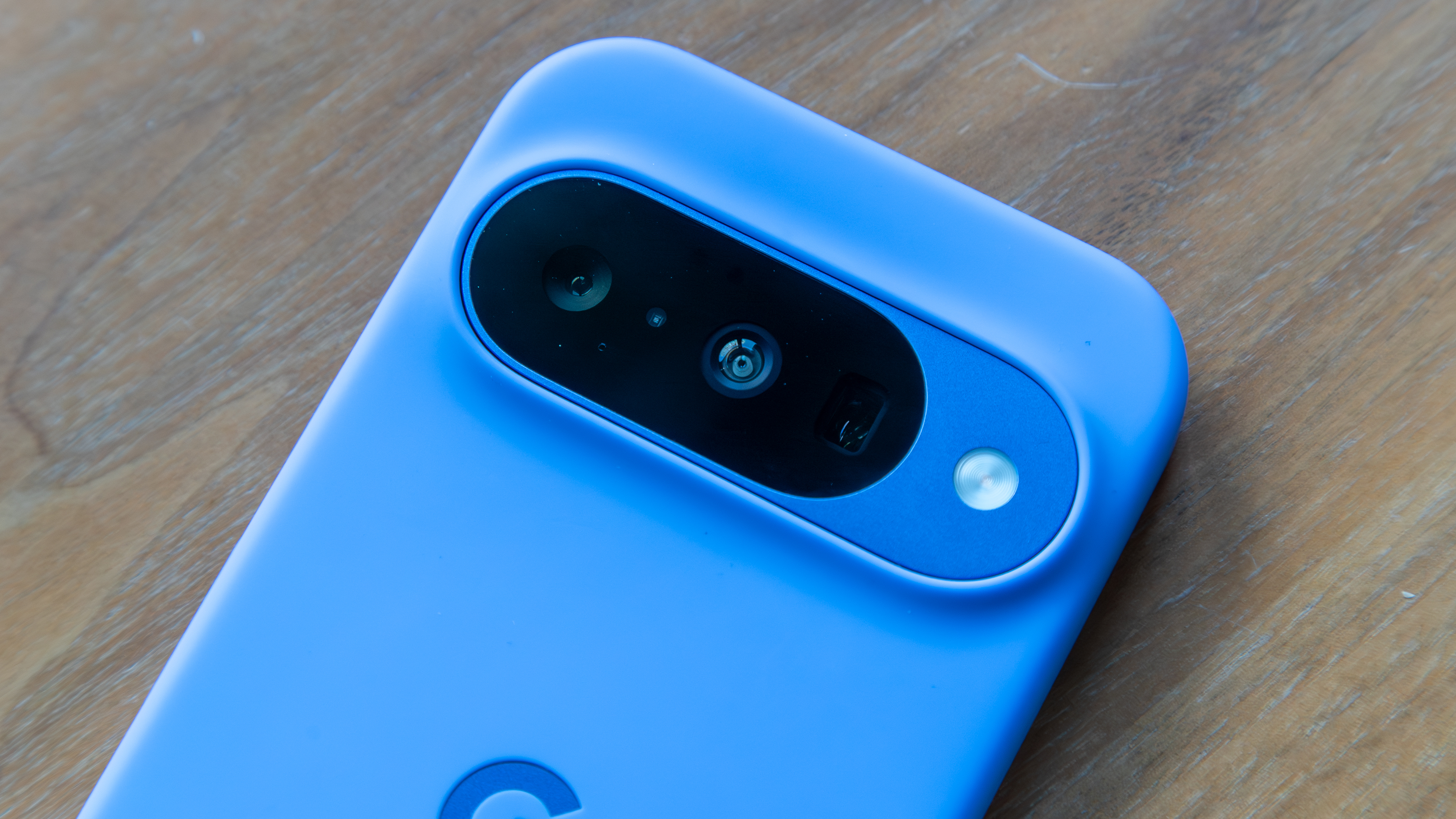 Pixel 10 with a blue Pixelsnap case