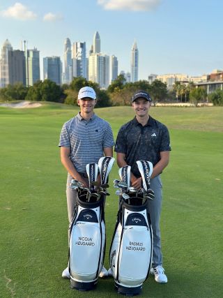 Nicolai and Rasmus Hojgaard pose with their new Callaway Golf bags