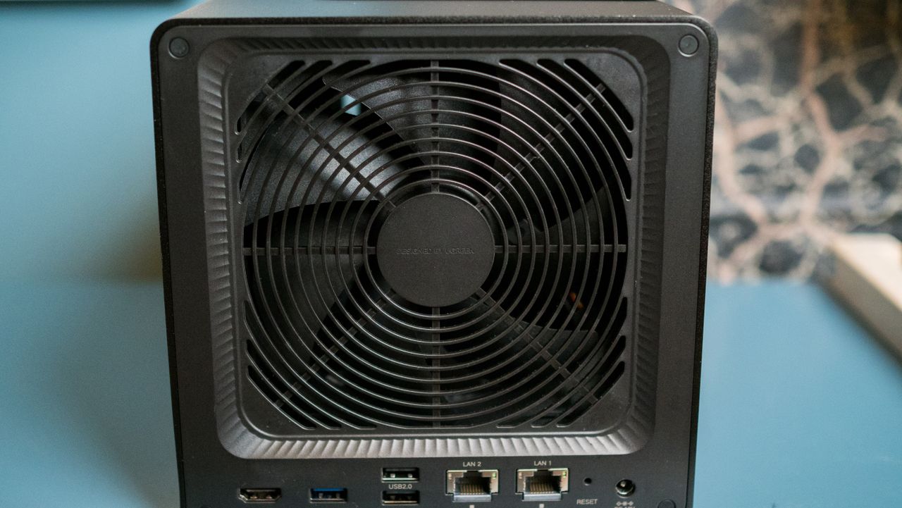 UGREEN DXP4800 GT 4-bay NAS on an IKEA shelf with 140mm fan highlighted