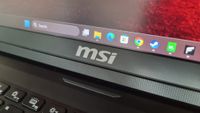 The MSI logo on the bottom of the screen of the MSI Raider 18 HX AI A2XW