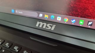 The MSI logo on the bottom of the screen of the MSI Raider 18 HX AI A2XW